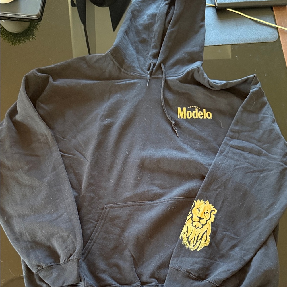 ModelCo Black Hoodie with Gold Lion Design